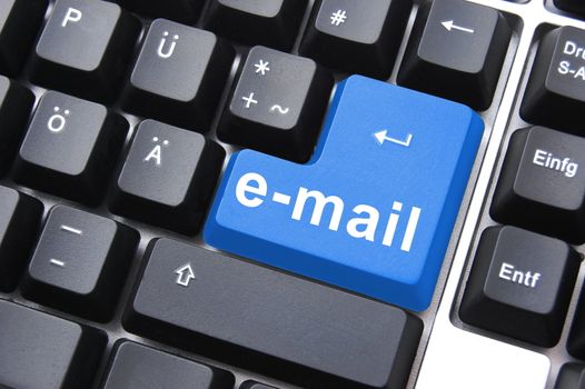 e mail text on a keyboard showing internet concept