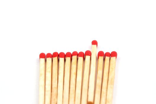 Some red matches isolated on a white background.