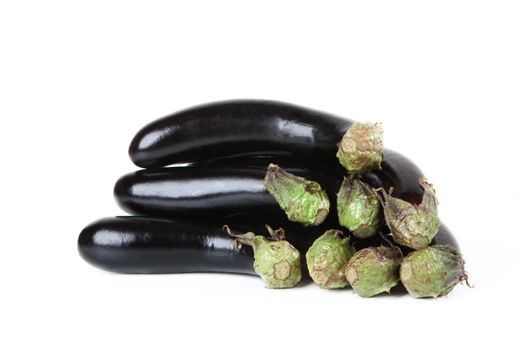 Pile of purple Aubergine ggplant on a white background