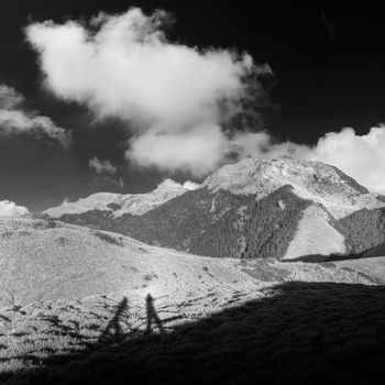 Nature in mountain with people shadow under the beautiful sky.