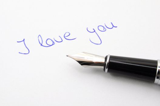 i love you message on paper with pan