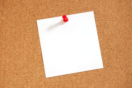 blank sheet paper with copyspace and pin on bulletin board