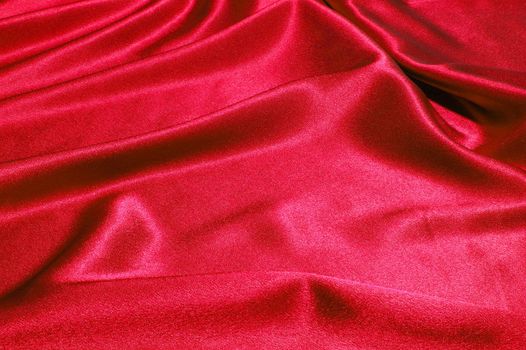 red satin or silk background with textile texture