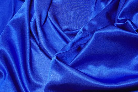 blue satin or silk background with textile texture