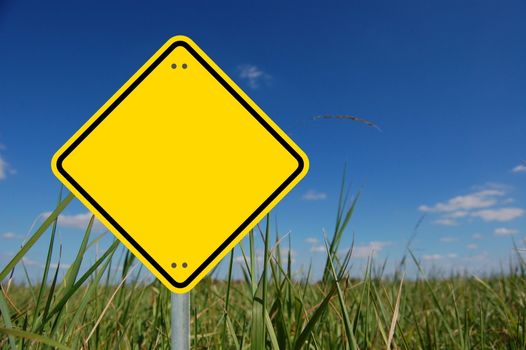 blank and empty yellow road sign with copyspace