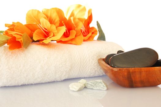 spa and bath still life with flowers and pebbles showing asian alternative medicine