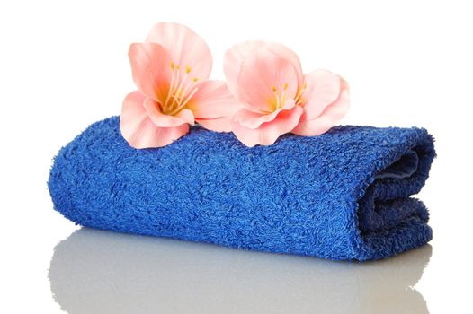 spa still life with towel and flower showing wellness concept