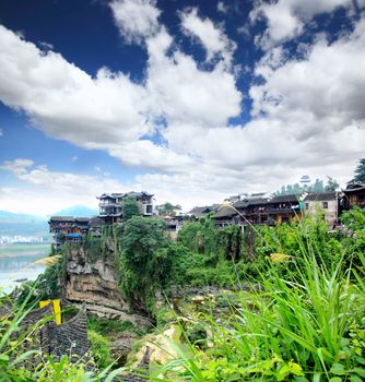 a scenery Chinese minority village best known in the movie Furongzhen