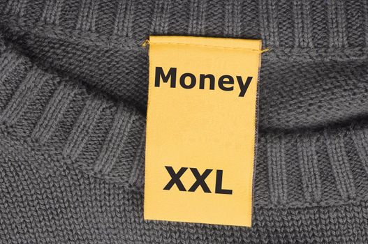 word money on xxl fashion label showing business success concept