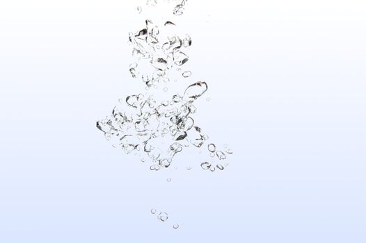 bubbles of air in water on white background