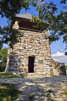 An old stone tower lookout area on top of Wayah Bald in North Carolina. It was used in the early 1900's and has the intersections of the Bartram Trail and the Appalachian Trail nearby. Wayah Bald has a vantage point 5,342 feet in elevation in the Nantahala National Forest, near Franklin, North Carolina. On a clear day, you can see north to the Great Smoky Mountains in Tennessee and south into the rolling hills of Georgia. It was listed on the National Historic Lookout Register in 2007. 
