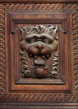 Woodcarvings. Detail of the gate on Old Town Hall in Prague.