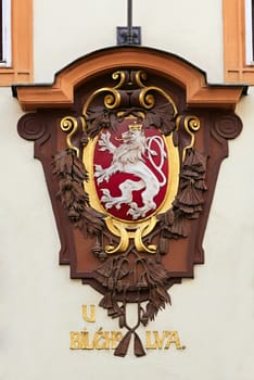 Exterior decoration of the house. Coat of Arms "The White Lion". Prague