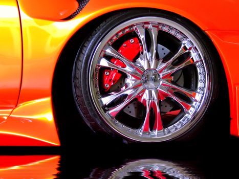 Detail of wheel section on a Japanese import modified car