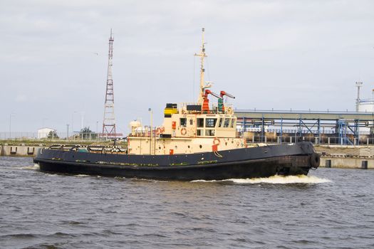 One of tugboats near the ferry terminal in the harbor in Ventspils, Latvia.