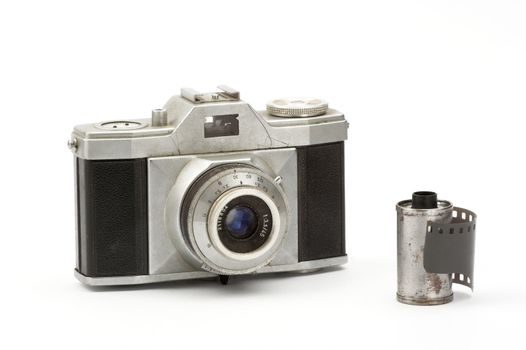 Old camera over white background