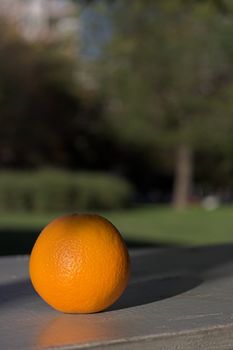 A orange on the table