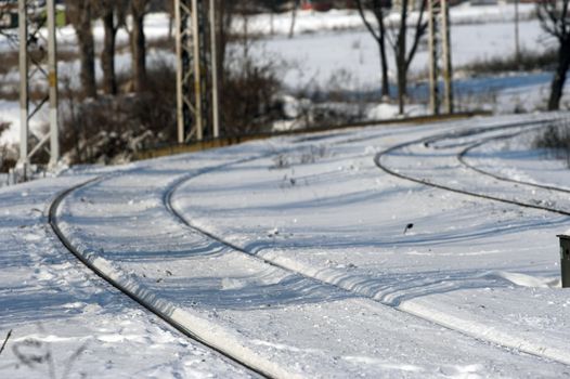 Train tracks under deep snow