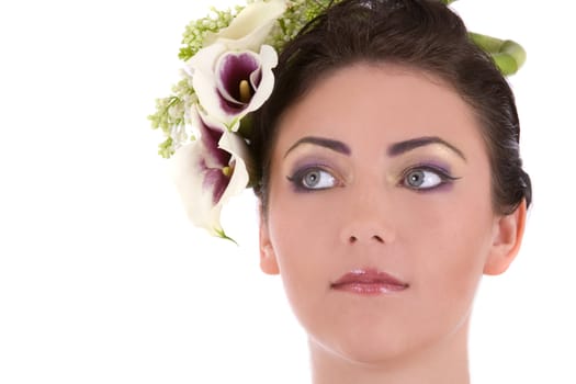 Beautiful woman with her hair decorated with flowers