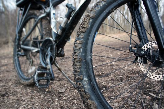 thick mud and rocks, stuck to a bike tire