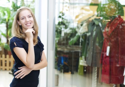 beautiful woman  in the mall, Thinks about purchases