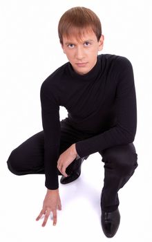 young man  in black on white background