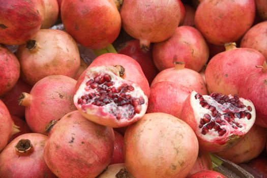 Delicious and healthy pomegranates on a market stall.