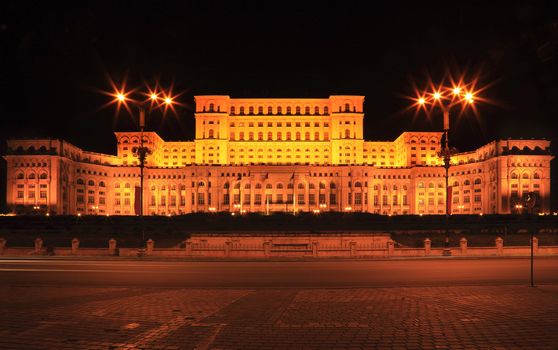 Night image of The Palace of the Parliament, also known as The People's House in the Cheauchesku's era, in Bucharest,Romania. The Palace is the world's largest civilian administrative building, The Pentagon being the largest overall. It is the most expensive and heaviest building in the world. (Wikipedia data)