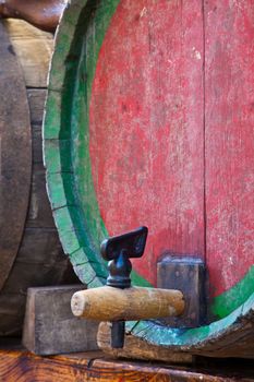 Italy - old tap on a barrel of Barbera wine, Piedmont region