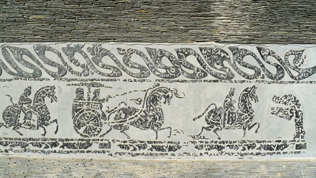Chinese ancient rock art of vehicles and horses 