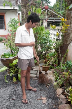 a picture of a garden man work in garden