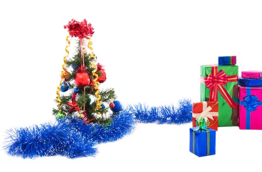 Christmas tree with gifts isolated over white