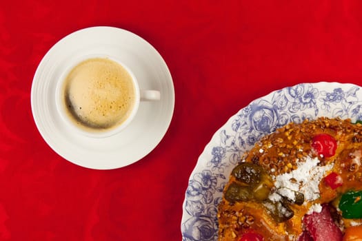 white cup of coffee  on red background