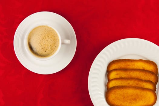 Coffee and cookies on a red background