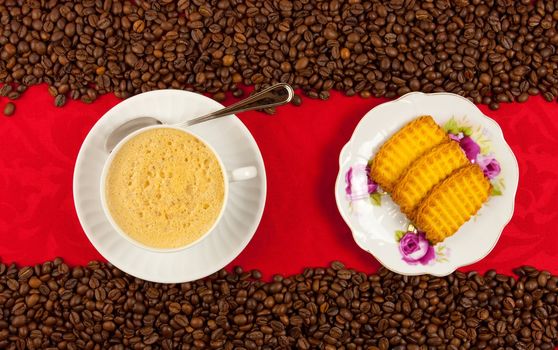 coffee cup from above with coffee beans