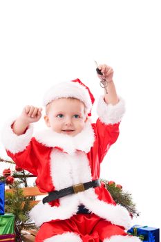 Happy toddler Santa with house or car keys