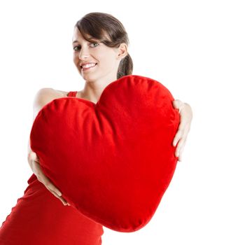 Beautiful young woman holding a red heart, Valentine concept