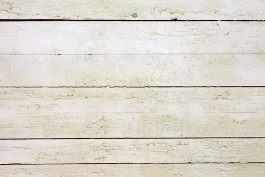 the background of weathered white painted wood