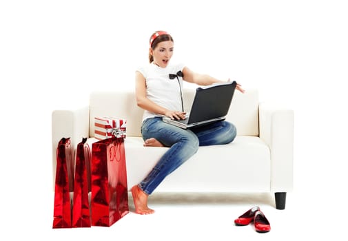 Beautiful young woman at home doing online shop, Consumerism concept
