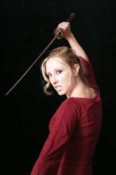 Dangerous woman swings a sword.   Don't mess with her.