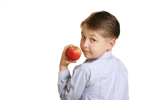 Boy holding an apple.  You could replace the apple with another item.