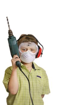 Young boy holding a power drill