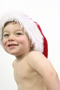 Young boy with a beautiful smile and green eyes at Christmas time.