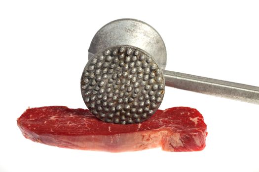 raw steak prepared for cooking isolated on white