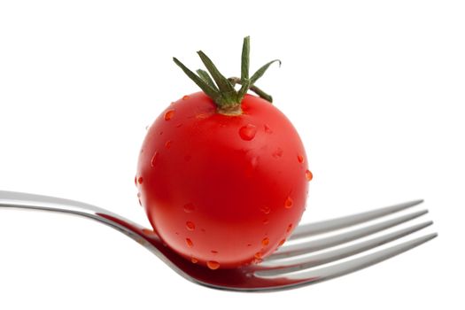 slice of a tomato on a fork