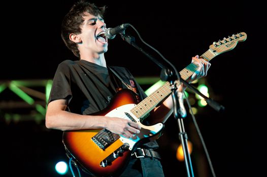 CANARY ISLANDS - JULY 22: Guitarist Toni Diaz from the band El Viejo Astra from Spain, performs onstage during a music festival on July 22, 2011 in Las Palmas, Canary Islands, Spain