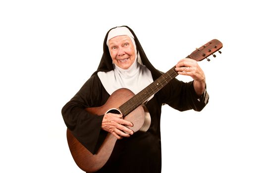 Funny singing nun with old guitar in black habit