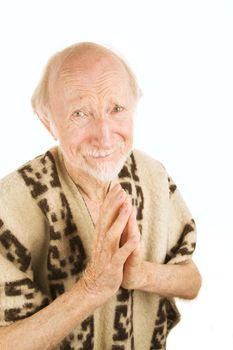 Praying Senior Man in South American Blkanket