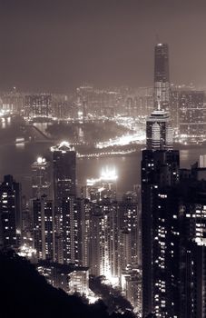 Landmark of Hong Kong city with famous building and skyscraper in the night.