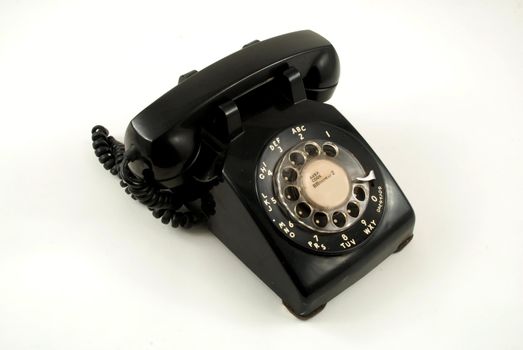 Pictures of an older, analog type telephone